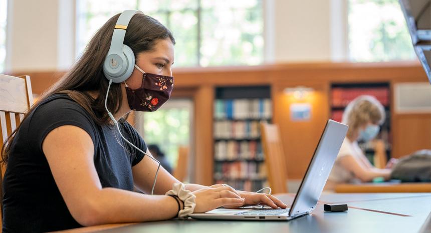 Person wearing mask in library