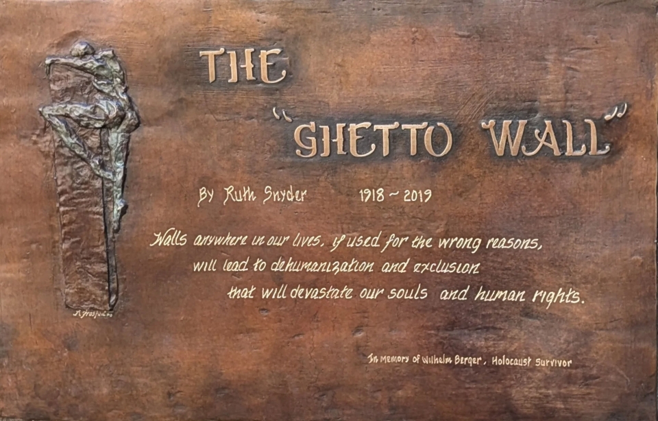 A plaque accompanying the sculpture reads: “Walls anywhere in our lives, if used for the wrong reasons, will lead to dehumanization and exclusion that will devastate our souls and human rights.”