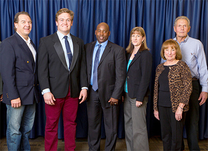 Hoyt at the 2014 Legacy Dinner. From left to right: Timothy Hoyt, Jordan Hoyt, Coach Ron Gould, Teresa Gould, Bonnie DeWit and Jack DeWit '66.